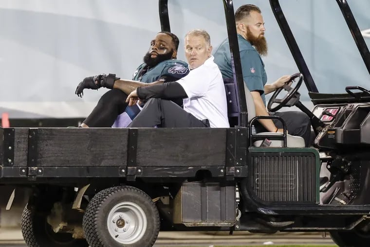 Eagles offensive tackle Jason Peters getting carted off the field after injuring his knee against the Washington Redskins on Oct. 23.