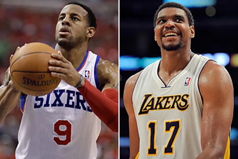 The Sixers have dealt Andre Iguodala and will receive Andrew Bynum in a four-team trade. (AP Photos)