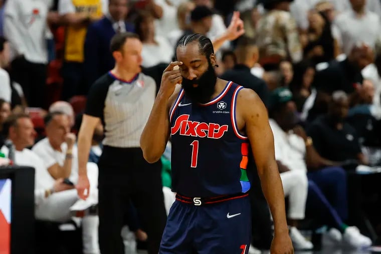 Sixers guard James Harden scratches his head walking down court against the Miami Heat during the fourth quarter in Game 2.