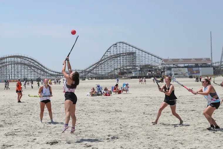 Cinnaminson and William Paterson compete in the Sticks in the Sand Beach Hockey Tournament on the beach in Wildwood on Saturday. Teams from New Jersey, Pennsylvania and along the East Coast competed in the tournament, which takes place Saturday and Sunday.