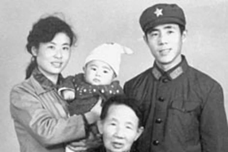 Lang Lang with his parents and maternal grandmother. His father says everything in the book is true.