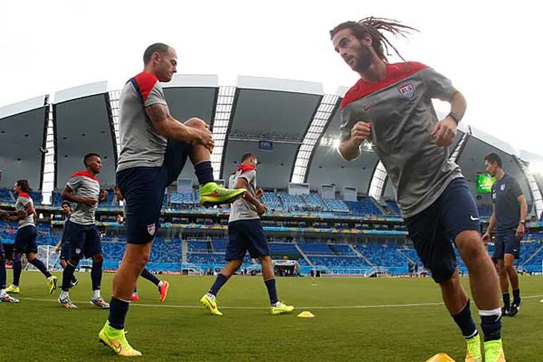 United States players warm up during an official training session the day before the group G World Cup soccer match between Ghana and the United States at the Arena das Dunas in Natal, Brazil, Sunday, June 15, 2014. (Julio Cortez/AP)