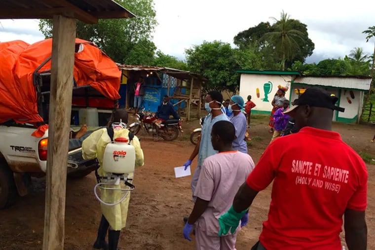 An ambulance waits outside an Ebola treatment center in Bong County.