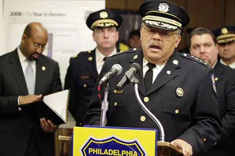 Philadelphia Police Commissioner Charles Ramsey  reviews the 2008 crime stats during a news conference at the 18th police district on Tuesday.  (David Maialetti / Staff Photographer)
