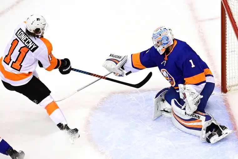 Flyers right winger Travis Konecny is stopped by New York Islanders goaltender Thomas Greiss during the first period of Game 4 in the conference semifinals.