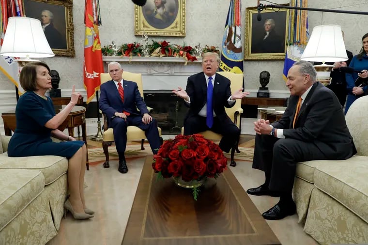 President Trump and Vice President Mike Pence, second left, meet with Senate Minority Leader Chuck Schumer, D-N.Y., right, and House Minority Leader Nancy Pelosi, D-Calif., in the Oval Office of the White House, Tuesday, Dec. 11, 2018, in Washington. (AP Photo/Evan Vucci)