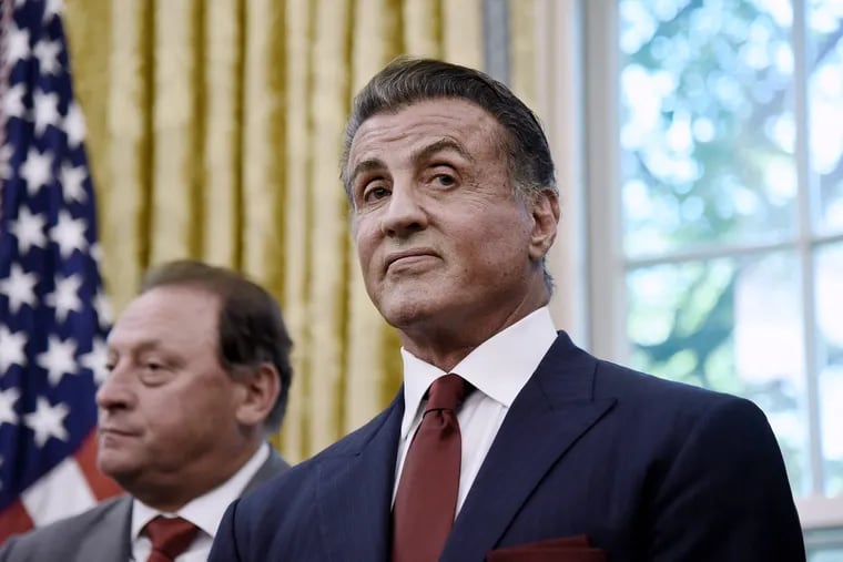 Actor Sylvester Stallone looks on during a signing ceremony to grant of clemency for former heavyweight champion Jack Johnson in the Oval Office of the White House on May 24, 2018, in Washington, D.C.