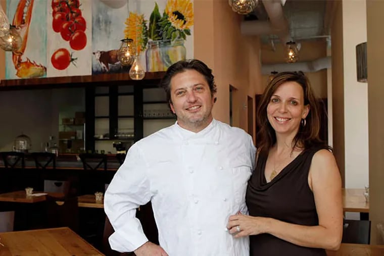 Bryan and Andrea Sikora in the bistro side of their La Fia Bakery + Market + Bistro in downtown Wilmington. (Michael S. Wirtz/Staff Photographer)