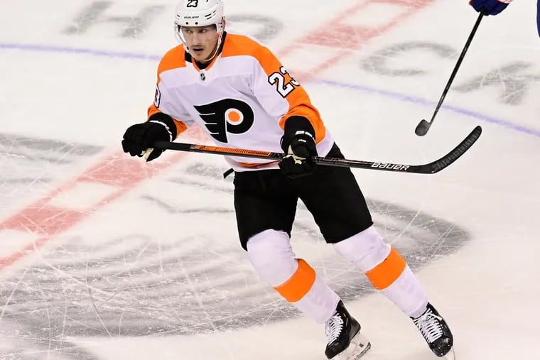 Philadelphia Flyers left wing Oskar Lindblom, returning to the lineup after battling cancer, skates up the ice during the second period against the New York Islanders in Game 6 of an NHL hockey second-round playoff series in Toronto on Thursday, Sept. 3, 2020. (Frank Gunn/The Canadian Press via AP)