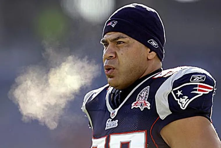 Police say Junior Seau, a former NFL star, was found dead at his home in Oceanside, Calif., Wednesday. (Charles Krupa/AP file photo)