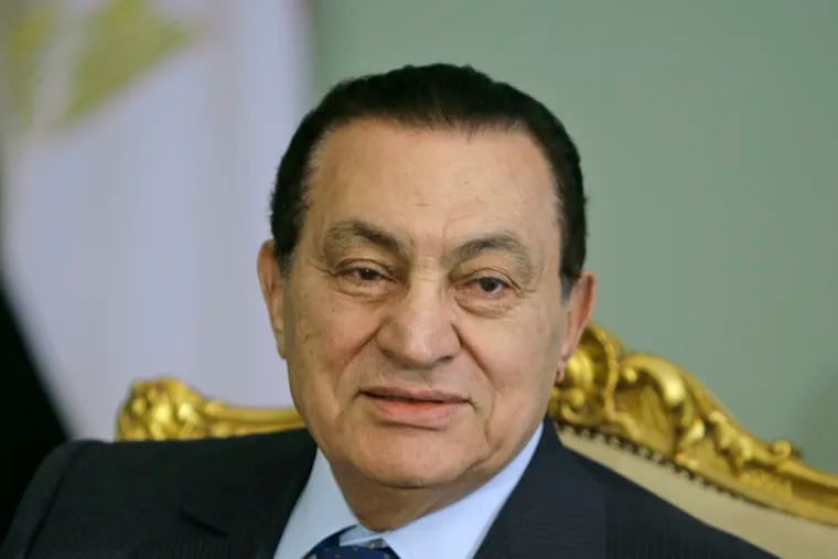 Egyptian President Hosni Mubarak looks attends a meeting at the Presidential palace, in Cairo, Egypt. Egypt state TV said Tuesday, Feb. 25, 2020. that the country's former President Hosni Mubarak, ousted in the 2011 uprising, has died at 91.