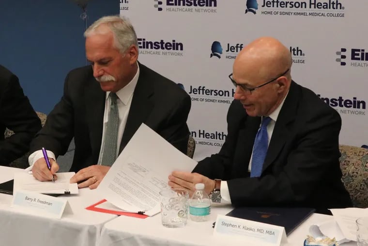 Former Einstein Healthcare Network chief executive Barry R. Freedman (left) with Stephen K. Klasko signed off on the deal in 2018.