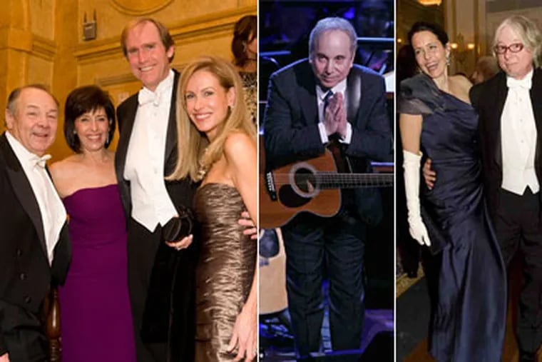From left: Robert J. Hall, COO of Philadelphia Media Network, his wife, Ronna, Gregory J. Osberg, CEO and publisher, and his wife, Linda; Paul Simon; Joanna McNeil Lewis and Mike Mills, bassist for the band R.E.M