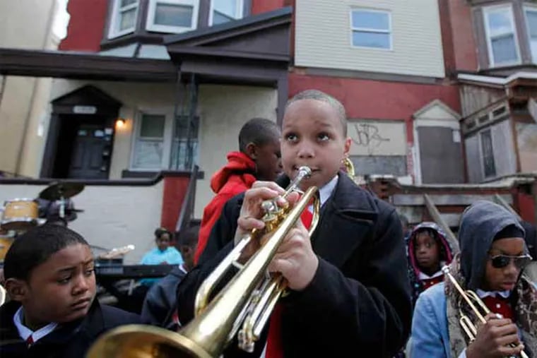 Students last spring played a little music to help kick off a fundraising effort to renovate the former Strawberry Mansion home of jazz great John Coltrane. (Associated Press)