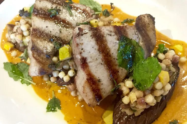 Grilled tuna with fregola, stuffed summer squash and smoked tomato vinaigrette from Lo Spiedo.