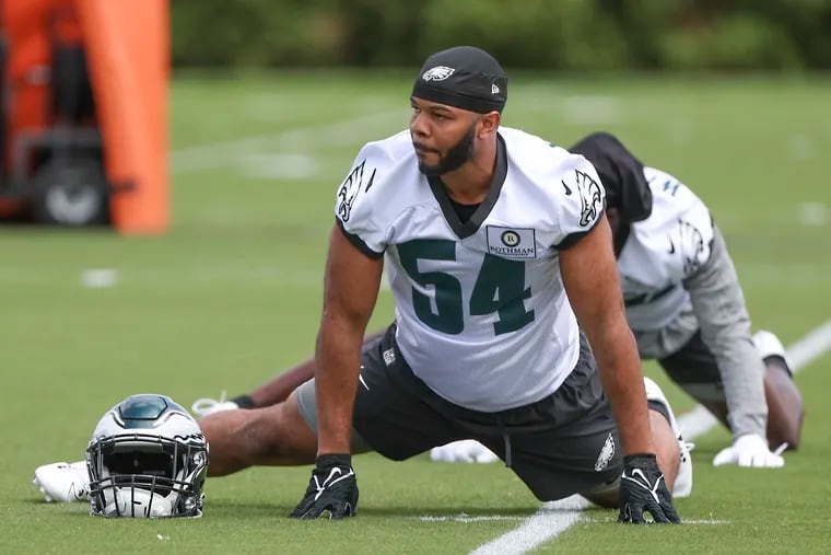 Eagles linebacker Jeremiah Trotter Jr. warms up during rookie minicamp at the NovaCare Complex in Philadelphia on Friday, May 3, 2024.