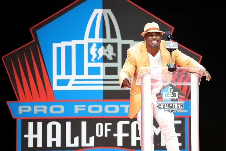 Brian Dawkins reacting as he talks about the Eagles' fans during the 2018 NFL Hall of Fame Enshrinement Ceremony in Canton, Ohio.