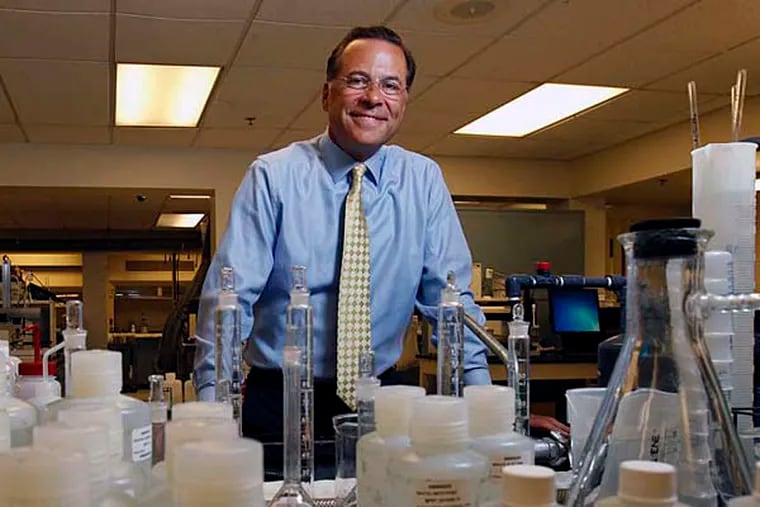 Christopher Franklin, new Aqua America CEO, in a water-testing lab at the company's headquarters in Bryn Mawr. (Michael Bryant/Staff Photographer)