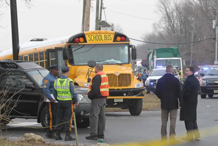 Scene of school bus and dump truck crash on Rt 528 Chesterfield Twp., February 16. (David M Warren / Staff Photographer)