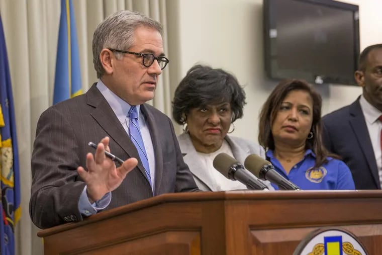 Philadelphia District Attorney Larry Krasner, left, announces end to cash bail in Philadelphia for low-level offenses, with City Councilwomen Jannie Blackwell, center, and Maria D. Quinones-Sanchez, right, by his side, on Feb. 21, 2018. MICHAEL BRYANT / Staff Photographer