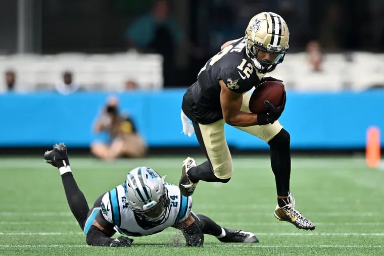 Chris Olave of the New Orleans Saints runs with the ball against the Carolina Panthers during the third quarter at Bank of America Stadium on September 25, 2022 in Charlotte, North Carolina. (Photo by Grant Halverson/Getty Images)