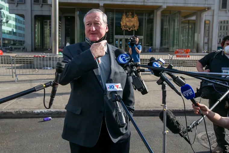 Philadelphia Mayor Jim Kenney gestures toward the site of the former location of Rizzo statue. He held a press conference regarding the removal of Rizzo statue.