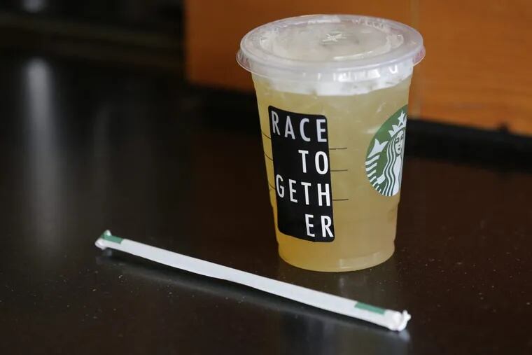 FILE – In this March 18, 2015, file photo, a Starbucks iced drink with a “Race Together” sticker on it is shown ready for pickup at a Starbucks store in Seattle. Starbucks, trying to tamp down a racially charged uproar over the arrest of two black men at one of its stores in Philadelphia, plans to close more than 8,000 U.S. stores for several hours next month to conduct racial-bias training for nearly 175,000 workers. The announcement Tuesday, April 17, 2018, comes after the arrests sparked protests and calls for a boycott on social media.