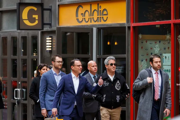 Governor Josh Shapiro walks with Israeli-born Michael Solomonov (right) after visiting his restaurant, Goldie, in Center City Philadelphia on Wednesday.