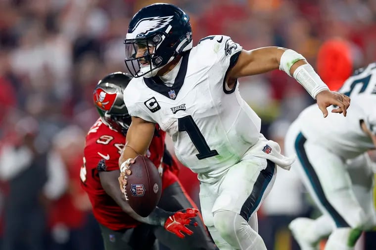 Jalen Hurts #1 of the Philadelphia Eagles plays during the NFC Wild Card game against the Tampa Bay Buccaneers at Raymond James Stadium on January 15, 2024 in Tampa, Florida.
