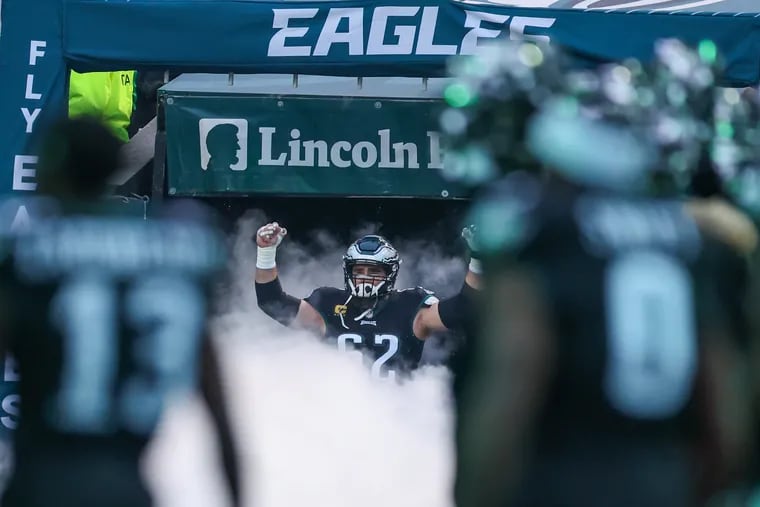 Eagles center Jason Kelce runs onto the field during player introductions before the start of the Birds' Christmas Day game against the Giants.
