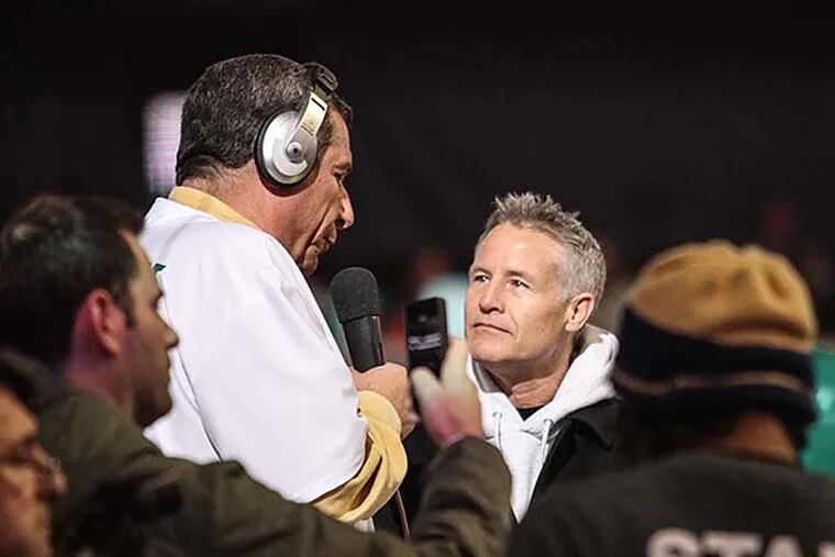 WIP's Angelo Cataldi interviews 76ers head coach Brett Brown during the Wing Bowl broadcast. (Stephanie Aaronson/Philly.com)
