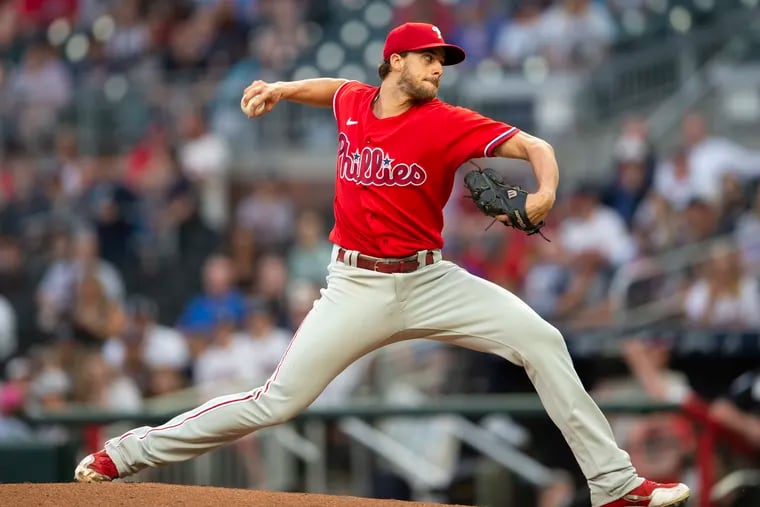 Philadelphia Phillies starting pitcher Aaron Nola throws during the first inning of the team's baseball game against the Atlanta Braves on Thursday, May 26, 2022, in Atlanta. (AP Photo/Hakim Wright Sr.)