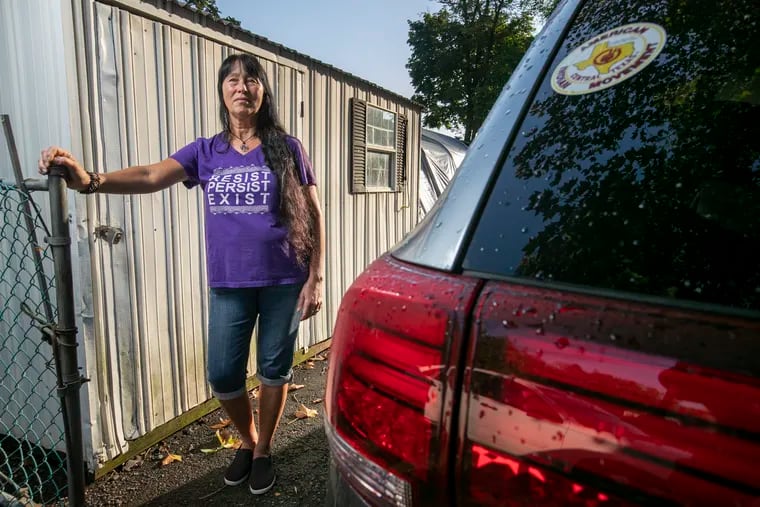 Donna Fann-Boyle of Langhorne, a leader in the Coalition of Natives and Allies, has been fighting for years to make the Neshaminy school district drop its nickname. The round sticker on her car supports the American Indian Movement of Central Texas.