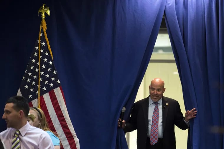 Rep. Tom MacArthur arrives for a town hall in Willingboro, N.J., Wednesday, May 10, 2017. MacArthur, a  Republican, played a key role during the summer in reviving a GOP effort to repeal and replace the Affordable Care Act. The attempt ultimately failed.