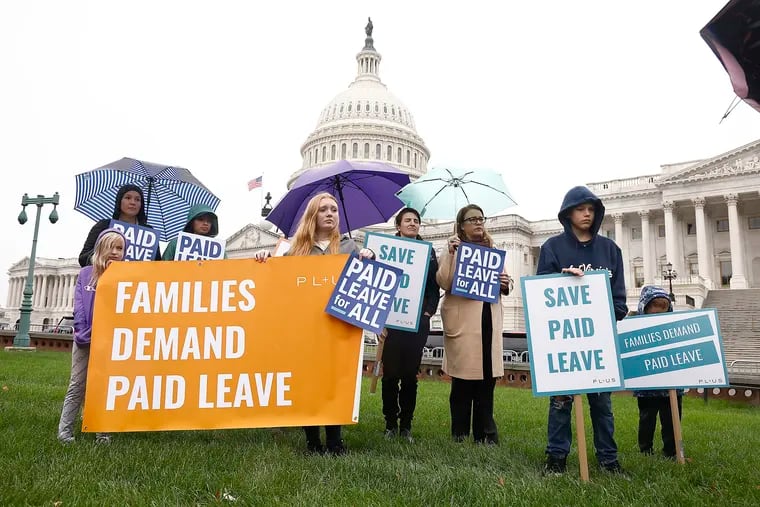 Protesters call for a national paid leave policy during a November 2021 demonstration outside the U.S. Capitol.