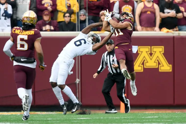 Minnesota defensive back Antoine Winfield Jr. (11) intercepted a pass intended for Penn State wide receiver Justin Shorter (6) in the first quarter.