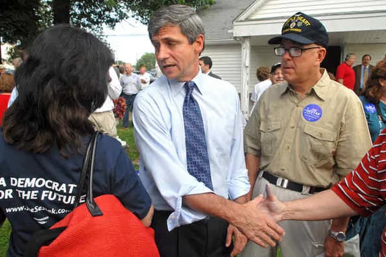 U.S. Rep. Joe Sestak greets supporters outside the Folsom VFW Post after announcing that he will run against Arlen Specter in the Democratic primary for U.S. Senate. Sestak said that like Barack Obama, he represents change.