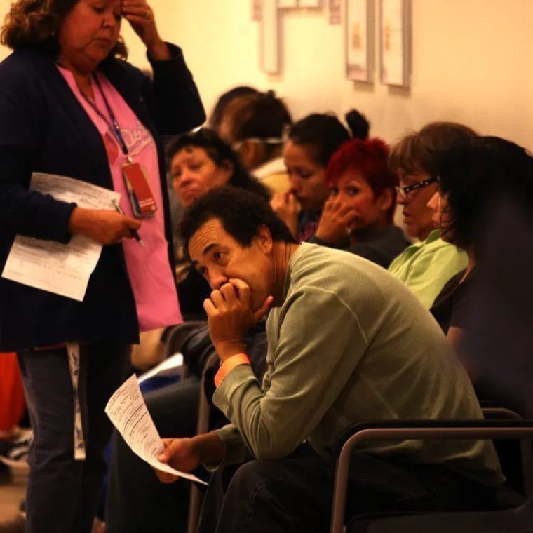 Emergency room visits in the Philadelphia area were typically 3.5 hour long in 2022. This photo shows patients waiting in the triage room of the emergency ward at L.A. County-USC Medical Center in Los Angeles.