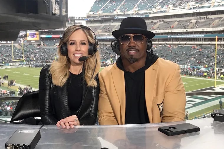 Eagles reporter Molly Sullivan (seen here alongside Hall of Famer Brian Dawkins) will work the sidelines for several Conference USA games this season on the NFL Network.