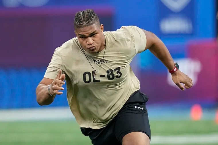 Oklahoma offensive lineman Walter Rouse runs a drill at the NFL football scouting combine, Sunday, March 3, 2024, in Indianapolis. (AP Photo/Darron Cummings)