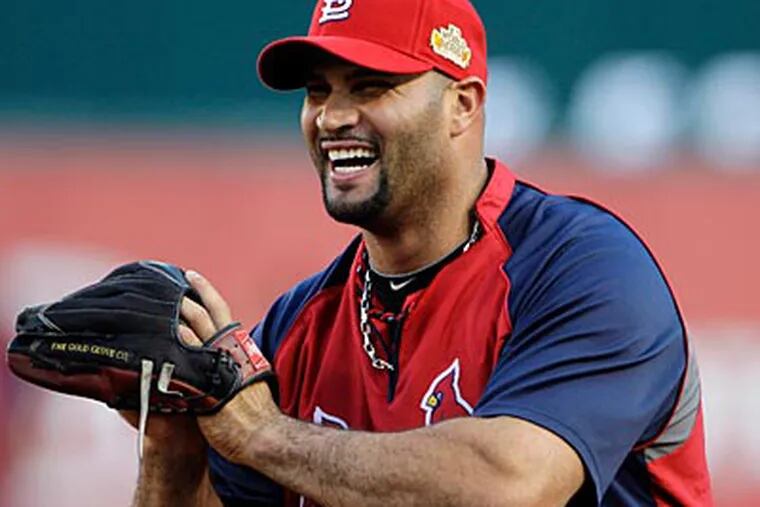 First baseman Albert Pujols signed a 10-year deal with the Angels on Thursday. (Tony Gutierrez/AP)