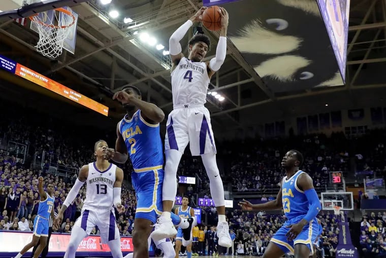 Washington guard Matisse Thybulle (4) could be a smart defensive pick for the Sixers if available at No. 24 in the NBA draft. (Ted S. Warren / AP Photo)