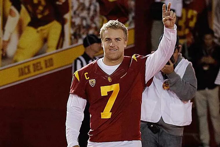 USC quarterback Matt Barkley walks from the tunnel as he is introduced to the crowd last during a senior ceremony before the game against Notre Dame, Saturday, Nov. 24, 2012, in Los Angeles. (Danny Moloshok/AP)