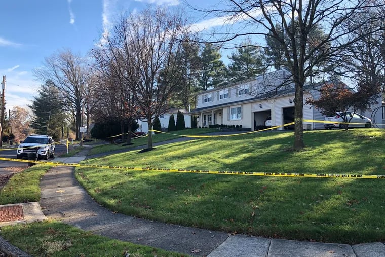 Lower Moreland Township Police kept watch Tuesday morning outside this home on Dale Road where they said Jeanne Edwards was killed in a domestic dispute late Monday.