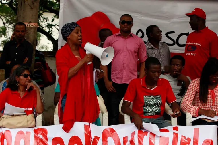 A woman speaks during a rally in Abuja, Nigeria, calling on the government to rescue the schoolgirls who were kidnapped from a school on April 15.