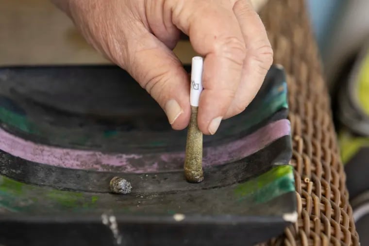 A pre-rolled joint is shown as the Justice Department moves to reclassify marijuana.