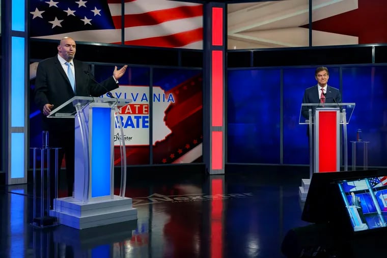 Democratic Senate candidate Lt. Gov. John Fetterman and Republican candidate Mehmet Oz debated in Harrisburg on Oct. 25, 2022.