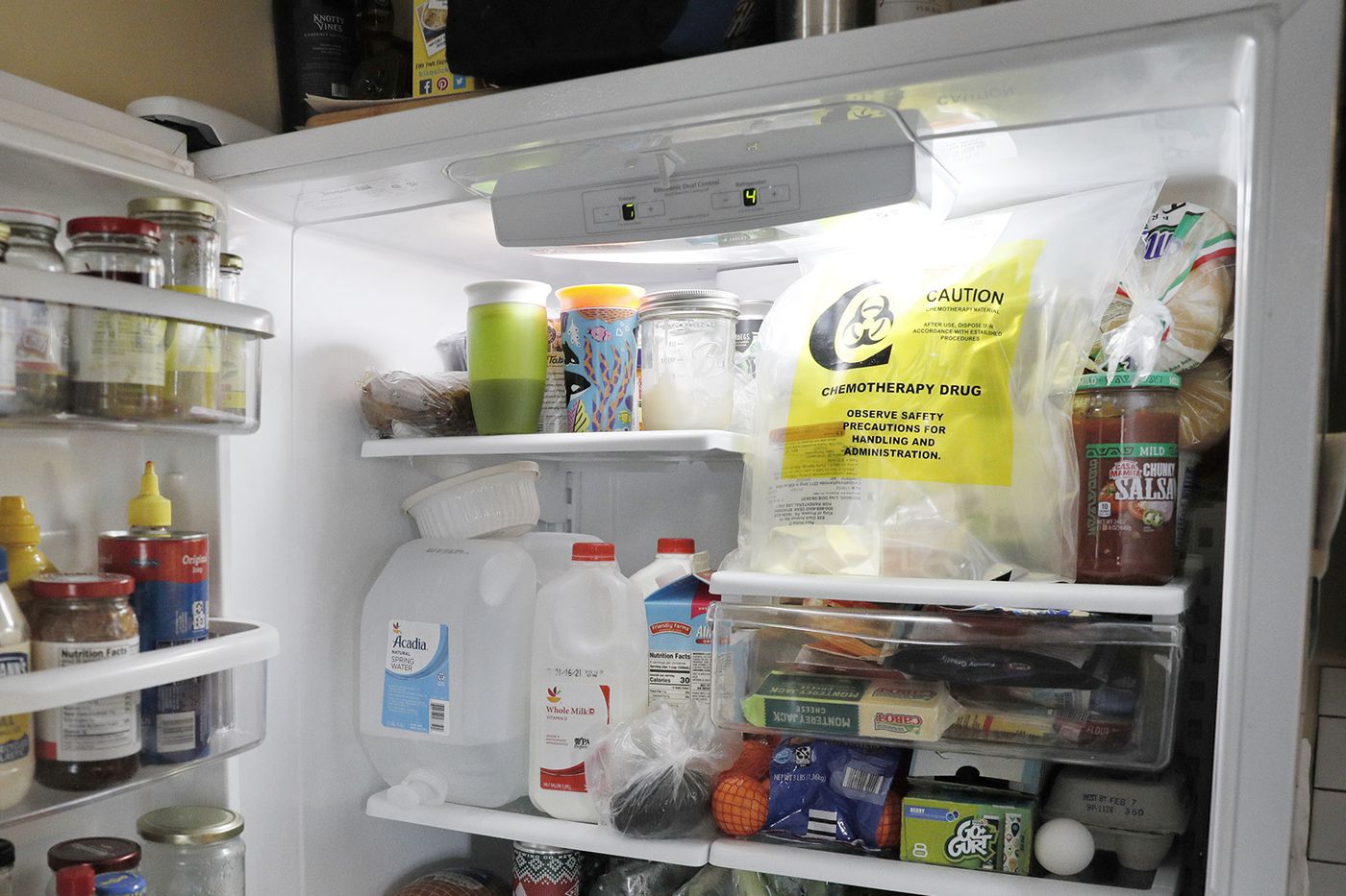 Lisa Oney’s chemotherapy drug (top right) is kept cold in the refrigerator of her home in Souderton in Bucks County. 