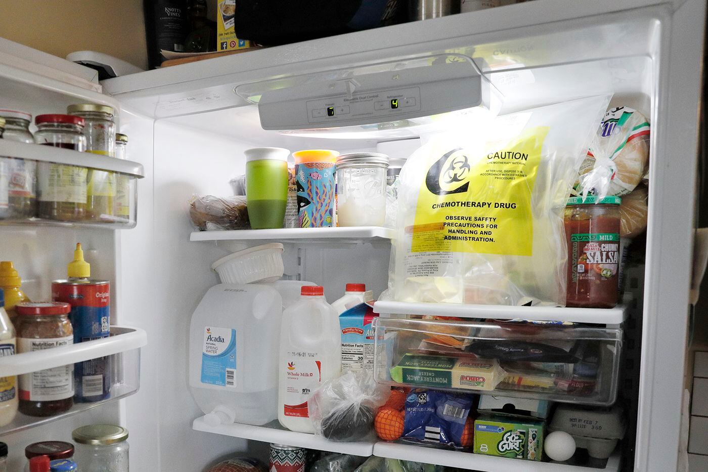 Lisa Oney’s chemotherapy drug (top right) is kept cold in the refrigerator of her home in Souderton in Bucks County. 