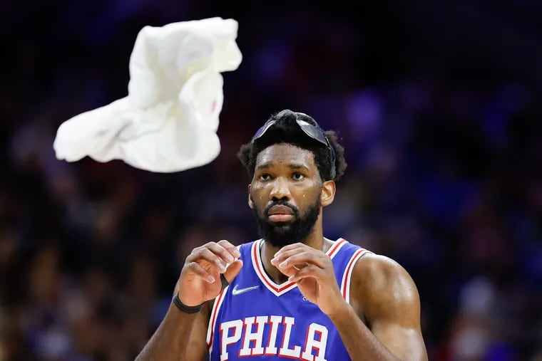 Sixers center Joel Embiid waits for a towel to use during the third quarter against Miami Heat in game three of the second-round Eastern Conference playoffs on Friday, May 6, 2022 in Philadelphia.